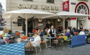<p><strong>Spend a slow afternoon at a Viennese coffeehouse.</strong></p>
<p>Capital cities usually mean capital price tags, but there are still plenty of <a href="https://www.getyourguide.com/vienna-l7/?partner_id=GZ1KO7T&amp;utm_medium=travel_agent">things to do on a budget in Vienna</a>, such as delving into the city&rsquo;s caf&eacute; culture. Coffeehouses are Viennese institutions &mdash; UNESCO even recognizes them as<strong>&nbsp;</strong>&ldquo;Intangible Cultural Heritage.&rdquo;</p>
<p>Grab a coffee, dig into an&nbsp;<em>Apfelstrudel&nbsp;</em>(apple strudel), and spend an afternoon with a book, observing the lively bustle of Austria&rsquo;s illustrious capital.</p>
<p>The older, more renowned coffeehouses offer the classiest architecture, but the aesthetic will cost you. If you want to save money in Austria, head down side streets to discover quieter haunts.</p>